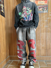 Pantalon décontracté à coupe ample avec motif graffiti