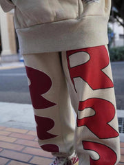 Pantalon décontracté à coupe ample avec motif graffiti